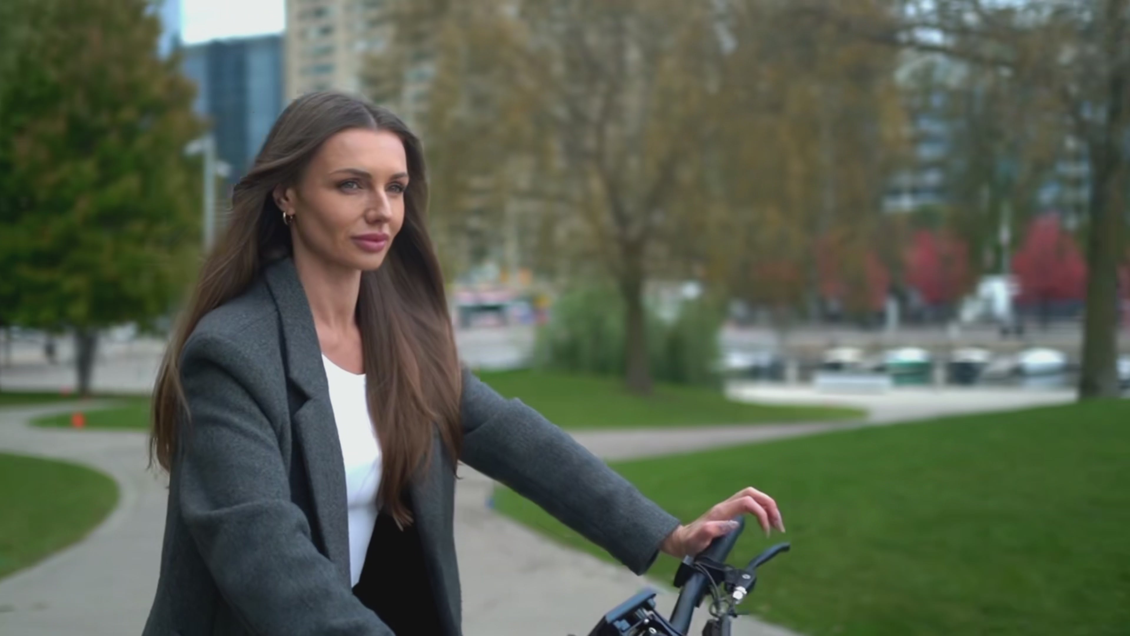 Load video: Commuting woman Riding E-bike around city  